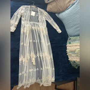 One Size. Beautiful Lace Cardigan. Tags Still on. Full Length.